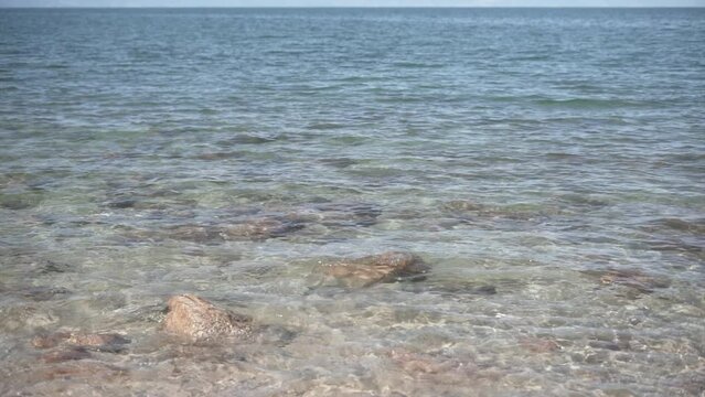 rocky beach shore in abel tasman national park 