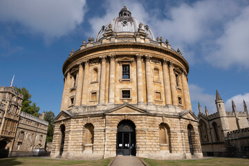 Fototapeta na wymiar Bodleian Library with the Radcliffe Camera, an iconic Oxford landmark in Oxford, Oxfordshire, England, United Kingdom