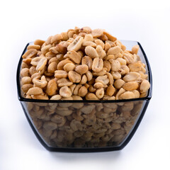 pile of spiced peanuts isolated close up on white background 