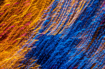 Abstract Long exposure light effect and colorful soft blurred bokeh on black background. Shining and blurred lights bokeh background. For used wallpaper texture and background.