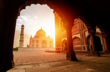 Taj Mahal on a bright clear day and sunset. Mosque for lover in city of Agra, Uttar Pradesh, INDIA....