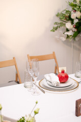 Beautiful wedding decoration. Banquet table setting and decoration. Flower decoration of wedding tables. Cutlery on the table.