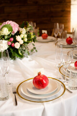 Beautiful wedding decoration. Banquet table setting and decoration. Flower decoration of wedding tables. Cutlery on the table.