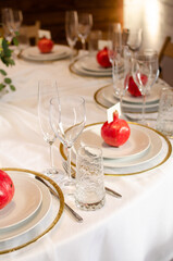 Beautiful wedding decoration. Banquet table setting and decoration. Flower decoration of wedding tables. Cutlery on the table.