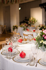 Beautiful wedding decoration. Banquet table setting and decoration. Flower decoration of wedding tables. Cutlery on the table.