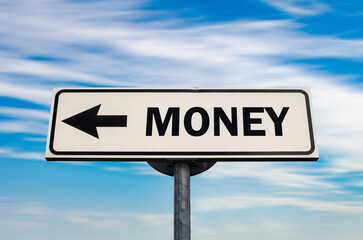 Money direction road sign on blue sky background.