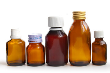 Medical bottle in the brown color on the white background