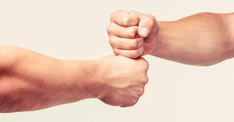 Two hands, isolated arm. Hands of man people fist bump team teamwork, success. Man giving fist bump