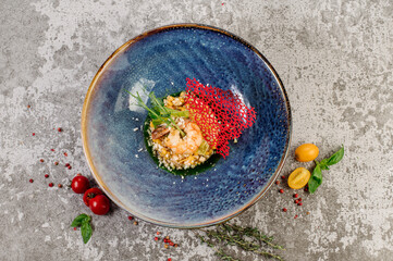 Vegan tartare dish with shrimp and herbs