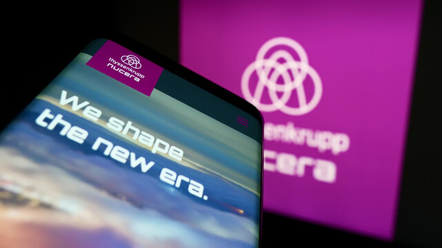 Stuttgart, Germany - 09-26-2022: Mobile phone with website of company thyssenkrupp nucera AG Co. KGaA on screen in front of business logo. Focus on top-left of phone display.