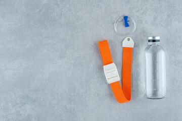 Medical ethanol with tool on gray background