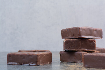 Bunch of milky chocolate on marble table