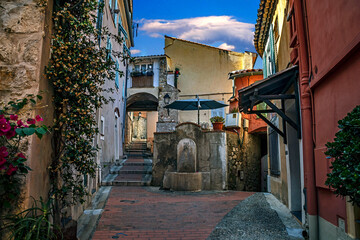 Fototapeta na wymiar View to the old streets and houses. City of Menton, southern France 
