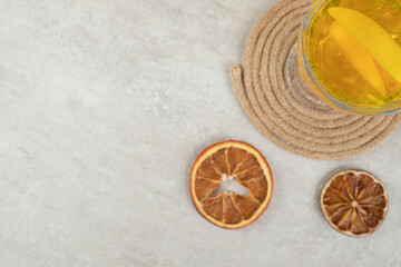 Glass of fresh lemonade with orange slices