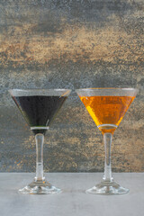 Delicious colorful drinks on marble background