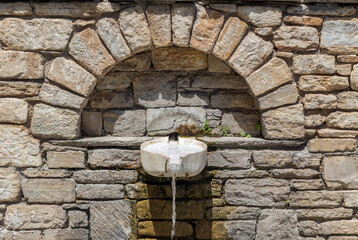 Stone springs in the mountains village Pinakates (South Pelion, Greece)