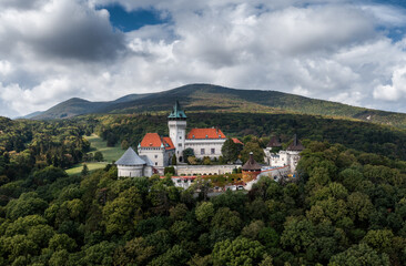 Fototapeta premium landscape of Smolenice Castle in the Little Carpathians in green late summer forest