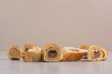 Bunch of sweet cookies on beige background