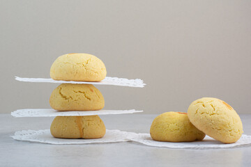 Stack of round cookies on gray background