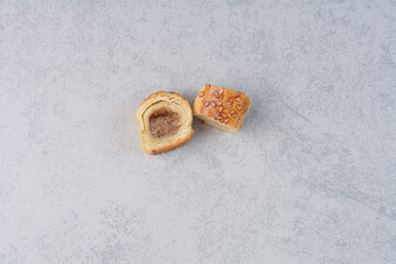 Tasty sweet cookie on gray background