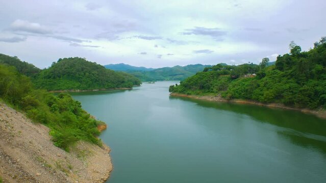 Beautiful Nature river natural landscape under blue sky, Aerial view of lake and green mountain, View on the lake between mountain forest, Timelaps, BCG concept.