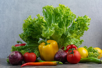 A lot of fresh vegetables on marble background