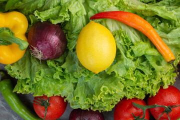 A lot of fresh vegetables on marble background