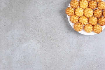 Homemade cookies on a plate on marble background