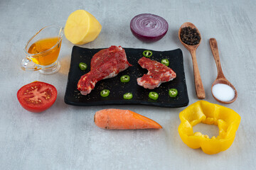 Preparation for chicken with oil, spices and vegetables