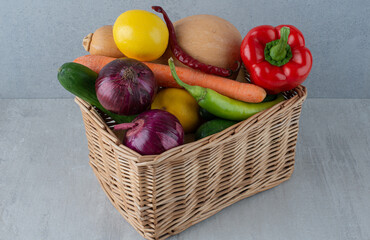Bunch of various vegetables in wooden basket