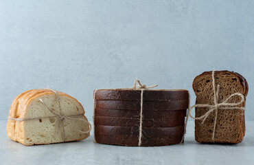 Various bread slices tied with rope
