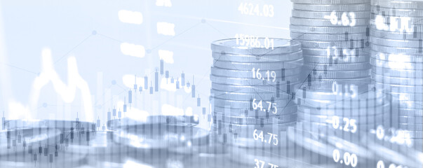 Double exposure of financial chart with line graph in stock market and stack of coins background
