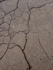 Obraz premium cracks in the asphalt