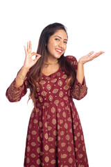 Happy young woman showing hand sign isolated on white.