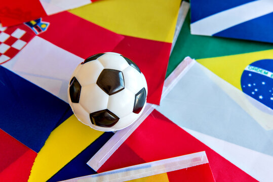 World Cup, Soccer Ball On Top Of Several Flags From Different Countries