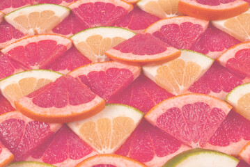 Pomelo and grapefruit slices background.