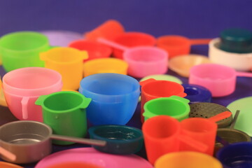 toys pans cups on blue background