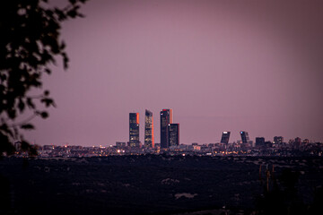 Fototapeta na wymiar Madrid's four skyscrapers and countryside.