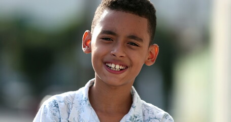 Brazilian hispanic little boy child portrait smiling outside