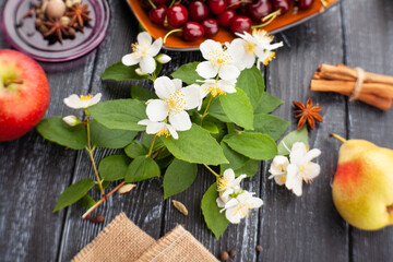 jasmine blossom on wood background