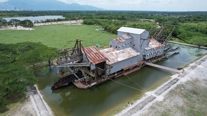 Fototapeta na wymiar Ipoh, Malaysia - September 24, 2022: The Historical Tin Dredge 