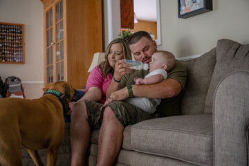 Marine veteran with service dog and family living life.