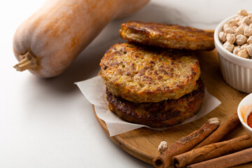 Close up of stack pumpkin vegetables fritters pancakes cinnamon healthy food