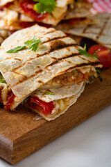Mexican food quesadilla with meat and cheese close up