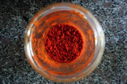 Closeup Of Red Pepper Powder In A Glass Jar