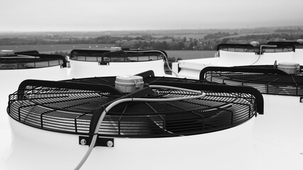 Industrial condenser fans on roof used in air conditioning, ammonia or co2 refrigeration, heat pump...