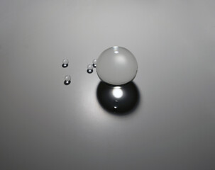 Glass spheres on a surface