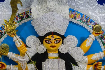 Fotobehang idol of goddess Durga during Durga Puja festival. Hindu deity in traditional white daker saj decorated attire. Durga puja is unesco approved heritage cultural festival in west bengal india. © suparna