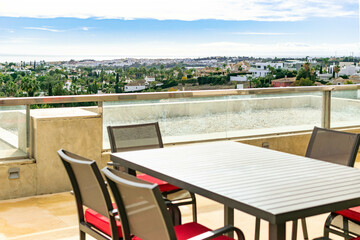 a terrace view from a dining tale on a luxury terrace overlooking the Costa Del Sol 