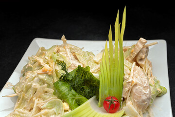 Vegetable salad with chicken and mayonnaise